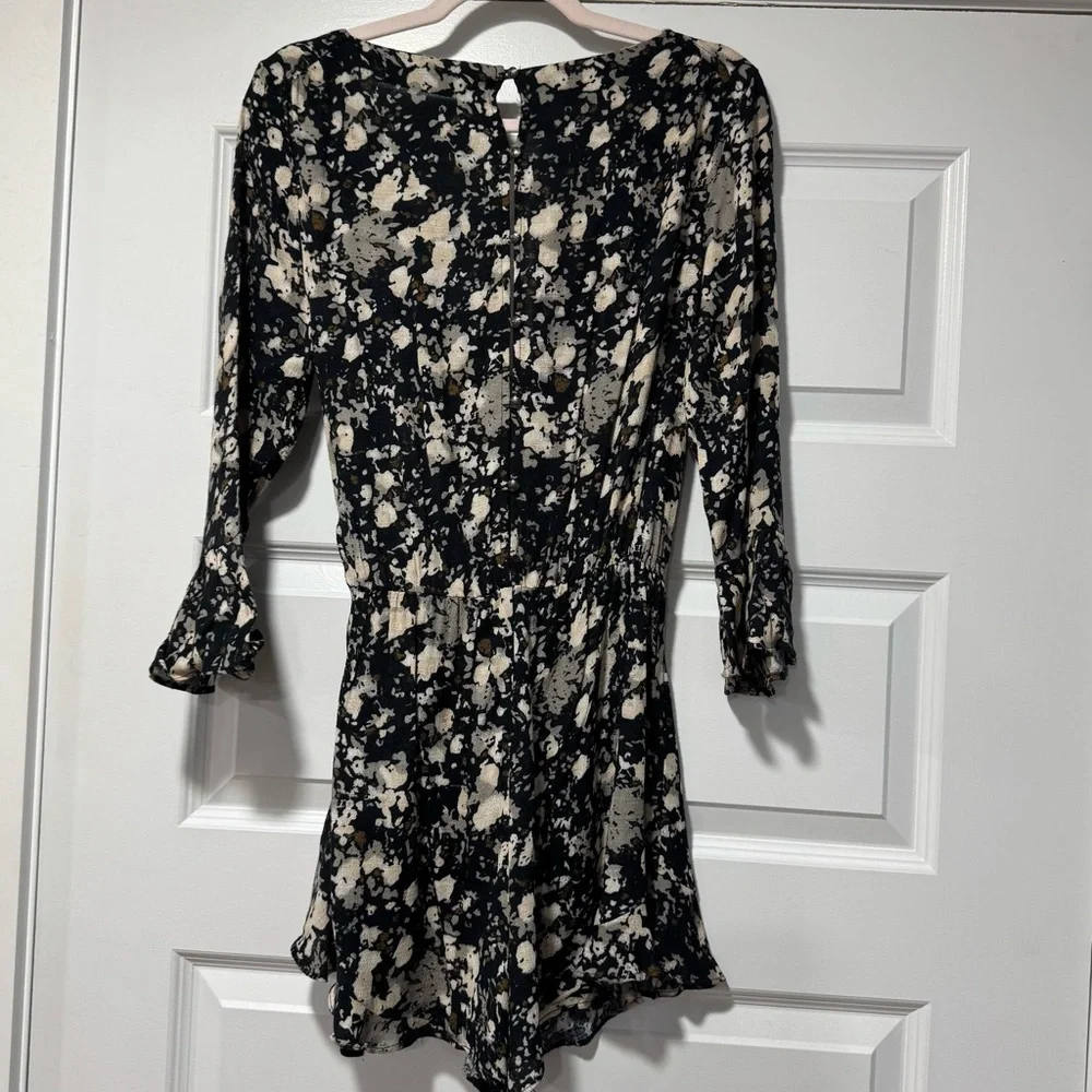 Free People Black and Cream Floral Wrap Romper with 3/4 Sleeves 02-0074